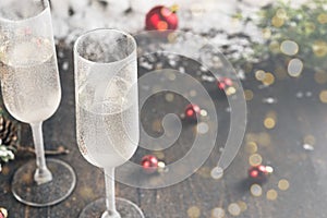 Christmas and New Year celebration with glasses of champagne