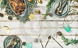 Christmas or New Year celebration table setting, wide composition