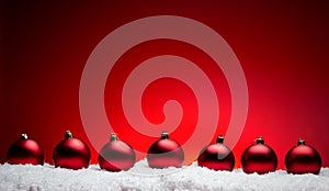Christmas new year composition balls with snow line red backgro