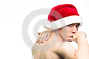 Christmas new year concept. Man with santa claus hat looking angry. Dangerous Guy with stylish hair on white background with