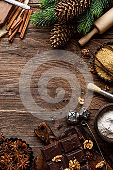 Christmas or new year culinary rustic wooden background with food ingredients for cooking festive dishes, xmas baking. Holiday coo