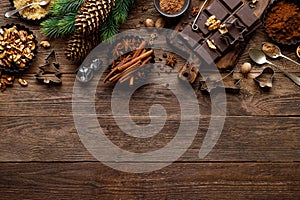 Christmas or new year culinary rustic wooden background with food ingredients for cooking festive dishes, xmas baking. Holiday coo