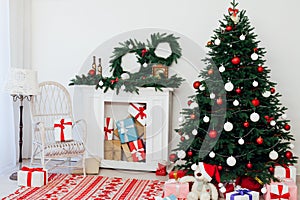 Christmas and New Year decorated interior room. Holiday decorated room with bed on window sill. Festive Xmas