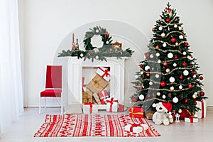 Christmas and New Year decorated interior room. Holiday decorated room with bed on window sill. Festive Xmas