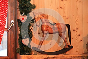 Christmas and New Year decoration decorative wooden rocking horse toy in retro style