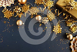 Christmas or new year decorations background in gold colors on grey background