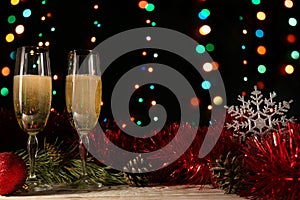 Christmas and New Year dinner of a couple with two glasses of champagne. The concept of the celebration.