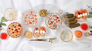 Christmas New Year dishes, detox diet concept, sauerkraut, traditional vegetable salad of cucumbers, tomatoes and radishes,