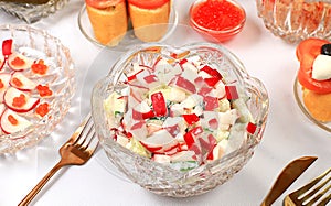 Christmas New Year dishes, detox diet concept, traditional holiday vegetable salad of cucumbers, tomatoes and radishes, healthy