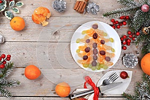 Christmas new year food, detox diet concept, traditional festive tangerine and grape salad, food design idea, place for recipe,