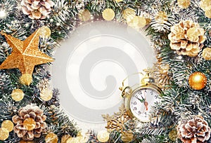 Christmas or New Year frame flat composition with green snow fir branches, pine cones, golden snowflakes, Christmas balls, red