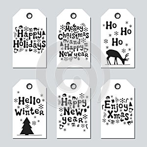 Christmas and New Year gift tags. Cards xmas set. Hand drawn elements. Collection of holiday paper label in black and