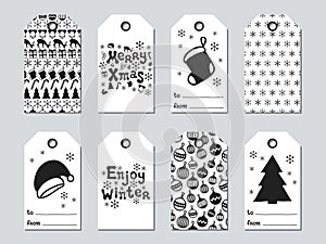 Christmas and New Year gift tags. Cards xmas set. Hand drawn elements. Collection of holiday paper label in black and