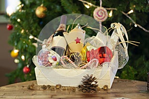 Christmas and New year gifts and baskets with sweets, alcohol, c