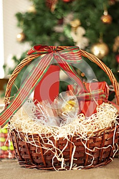 Christmas and New year gifts and baskets with sweets, alcohol, c