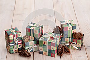 Christmas and New Year gifts packed in boxes with winter ornaments. The concept of surprises and souvenirs for loved ones.