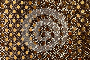 Christmas New Year Gold Glitter background. Holiday abstract texture fabric