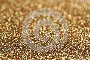 Christmas New Year Gold and Silver Glitter background. Holiday abstract texture