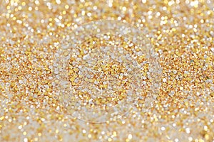 Christmas New Year Gold and Silver Glitter background. Holiday abstract texture