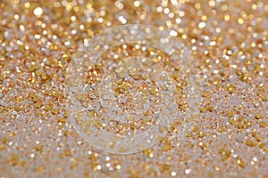 Christmas New Year Gold and Silver Glitter background. Holiday abstract texture