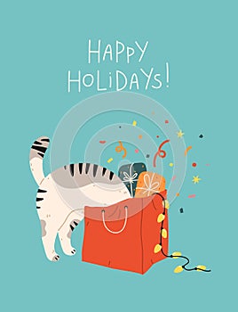 Christmas and New Year greeting holiday card with curious cute cat climbed into shopping bag