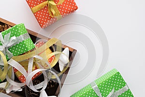 Christmas and New Year holiday composition with gift boxes , ribbons on the white background. Top view, flat lay