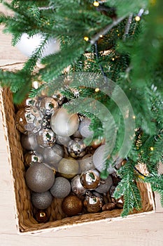 Christmas New Year holiday decor glittering balls and Christmas trees on pink background