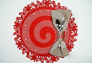 Christmas And New Year Holiday Table Place Setting. Top view, red woolen background. Winter holidays concept