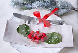 Christmas And New Year Holiday Table Setting. Celebration. Place setting for Christmas Dinner. Holiday Decorations. Decor.