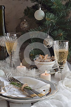 Christmas And New Year Holiday Table Setting. Celebration. Place setting for Xmas Dinner. Holiday Decorations. Decor. Plate, Tange