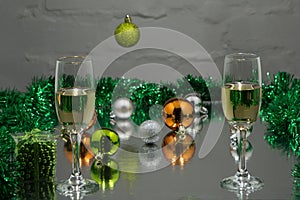 Christmas And New Year Holiday Table Setting with Champagne. Celebration. Place setting for Christmas Dinner. Holiday Decorations.