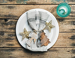 Christmas, New Year holiday table setting over wooden background