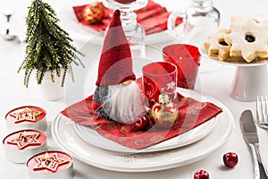 Christmas And New Year Holiday Table Setting.  Place setting for Christmas Dinner. Holiday Decorations