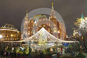 Christmas New Year holidays decoration in Moscow at night, Russia-- Manege Square near the Kremlin