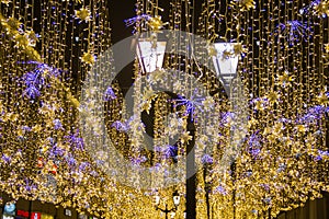 Christmas and New Year holidays illumination outdoor in city street at night