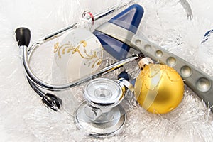 Christmas and New Year in medicine idea. Stethoscope internal medicine and neurological hammer neurology and neuroscience are