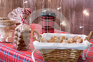 Christmas, New year pastry shop. Gingerbread, marshmallows, cookies, sweets hot chocolate and coffee on the counter