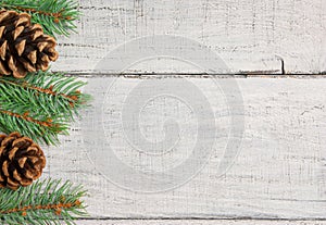 Christmas new year pine tree and cones decoration background. xmas and christmas on white wooden table backdrop copy spaces