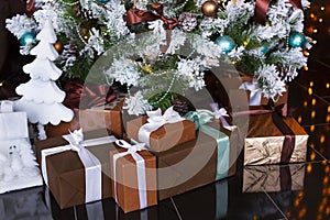 Christmas or New Year presents or gifts under dressed Christmas tree