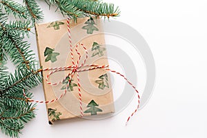 Christmas or new year`s background, plain composition of Christmas gifts and fir branches, Flatlay, empty space for greeting text