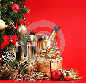 Christmas or New Year's Eve. Champagne and Presents over Red