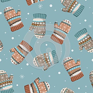 Christmas and New Year seamless pattern with winter gloves and mittens.