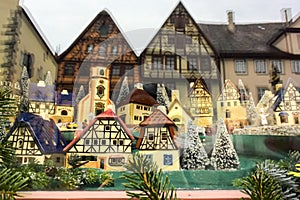 Christmas and New Year souvenirs in form of Bavarian half-timbered houses in shop window. Rothenburg ob der Tauber, Germany