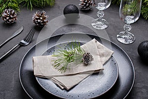 Christmas or New Year table setting. Place setting for Christmas Dinner. Holiday Decorations.