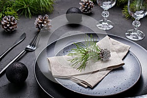 Christmas or New Year table setting. Place setting for Christmas Dinner. Holiday Decorations.