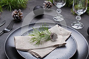 Christmas or New Year table setting. Place setting for Christmas Dinner. Holiday Decorations.