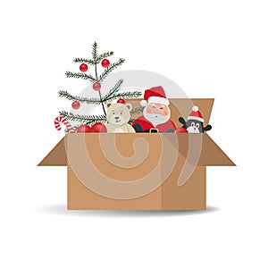 Christmas and New Year toys in cardboard box. Santa Claus, Christmas tree with red balls, Teddy bear, penguin