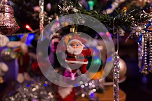 christmas and new year  christmas tree decorated with different christmas toys close-up.