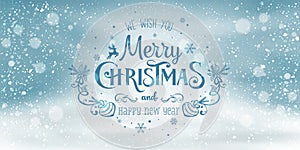 Christmas and New Year Typographical on snowy Xmas background with winter landscape with snowflakes, light, stars.