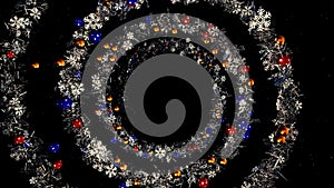 Christmas or New Year wreath spiral spinning on black background, seamless loop. Animation. Abstract blue garland of